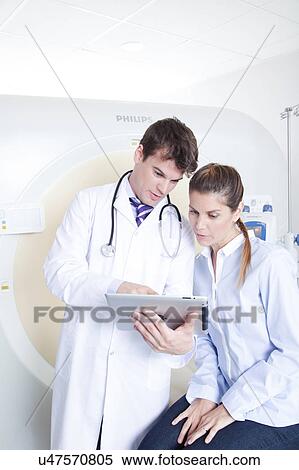 Stock Photography - Woman get a tomography. Fotosearch