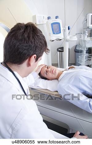 Stock Photography - Woman get a tomography. Fotosearch
