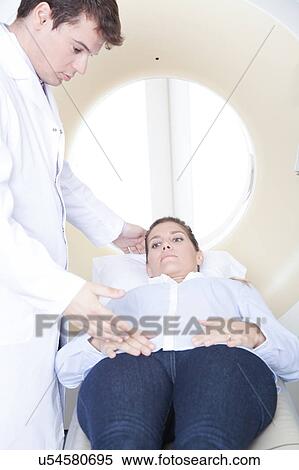 Stock Photography - Woman get a tomography. Fotosearch