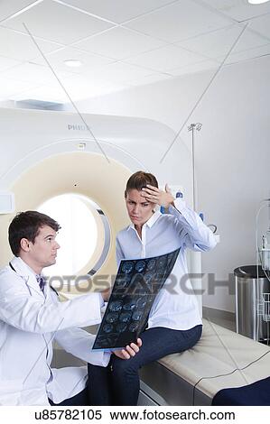 Stock Photography - Woman get a tomography. Fotosearch
