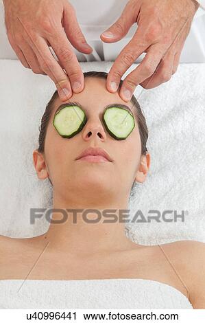 Stock Image - Woman gets a massage. Fotosearch