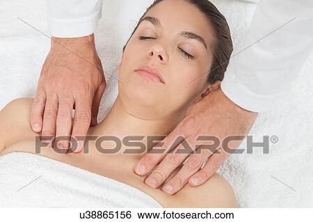 Woman getting massage View Large Photo Image Stock Photograph - Woman getting massage. Fotosearch