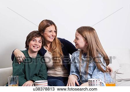 Stock Image - Woman having a good time with his childrens. Fotosearch