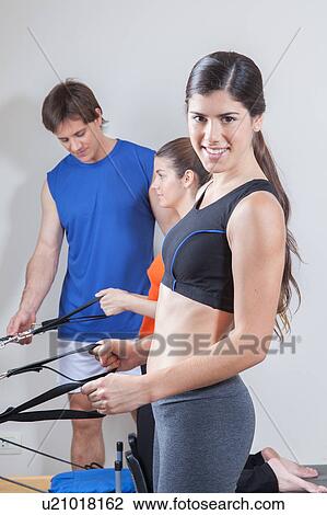 Woman in the gym View Large Photo Image Stock Image - Woman in the gym. Fotosearch