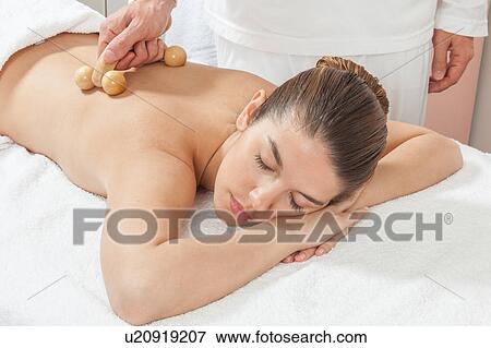 Woman lying gets great massage View Large Photo Image Stock Photo - Woman lying gets great massage. Fotosearch