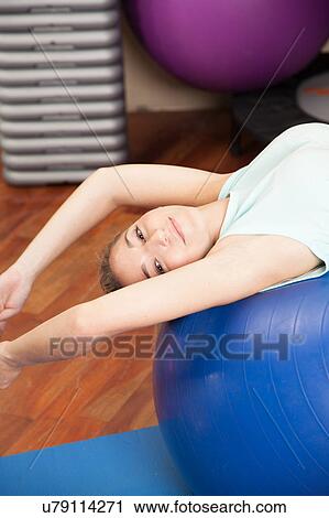 Woman making yoga View Large Photo Image Stock Image - Woman making yoga. Fotosearch
