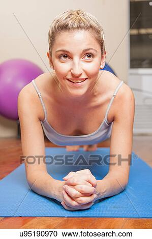 Woman making yoga View Large Photo Image Stock Image - Woman making yoga. Fotosearch