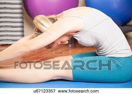 Woman making yoga View Large Photo Image Stock Photo - Woman making yoga. Fotosearch
