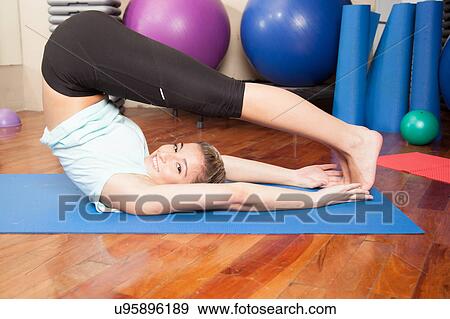 Woman making yoga View Large Photo Image Stock Photo - Woman making yoga. Fotosearch