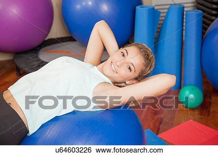 Woman making yoga View Large Photo Image Stock Photograph - Woman making yoga. Fotosearch