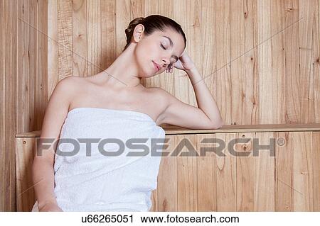 Woman relaxed inside the sauna View Large Photo Image Stock Image - Woman relaxed inside the sauna. Fotosearch