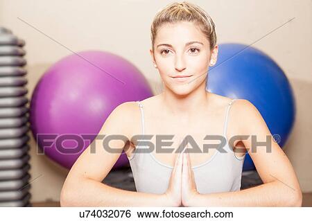 Woman relaxing in yoga View Large Photo Image Stock Photograph - Woman relaxing in yoga. Fotosearch
