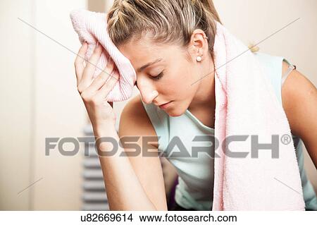 Woman resting after to yoga class View Large Photo Image Picture - Woman resting after to yoga class. Fotosearch