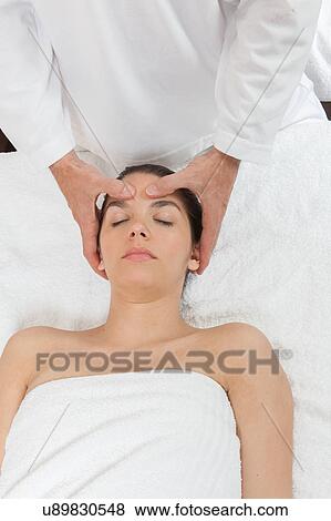woman sleeps while giving a massage View Large Photo Image Stock Photo - woman sleeps while giving a massage. Fotosearch