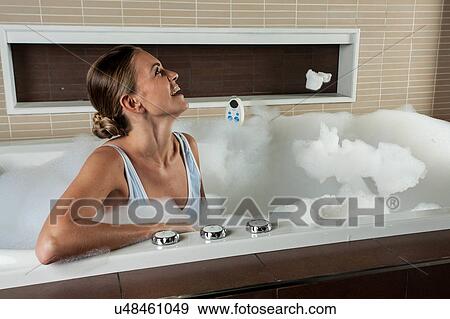 woman taking a shower View Large Photo Image Stock Photo - woman taking a shower. Fotosearch