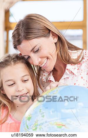 Stock Photo - woman teaching geography.. Fotosearch