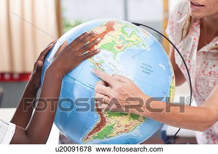 Stock Photo - woman teaching geography.. Fotosearch