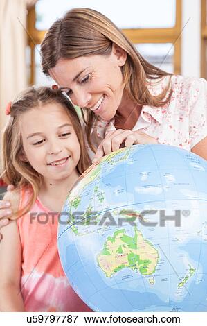 Stock Photo - woman teaching geography.. Fotosearch