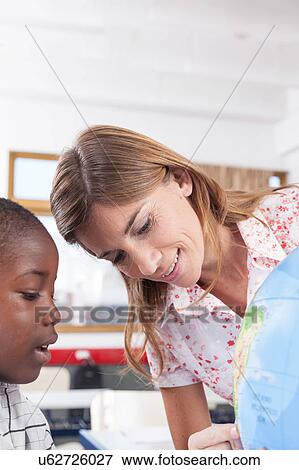 woman teaching geography. View Large Photo Image Stock Photo - woman teaching geography.. Fotosearch