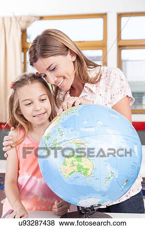 Stock Photo - woman teaching geography.. Fotosearch