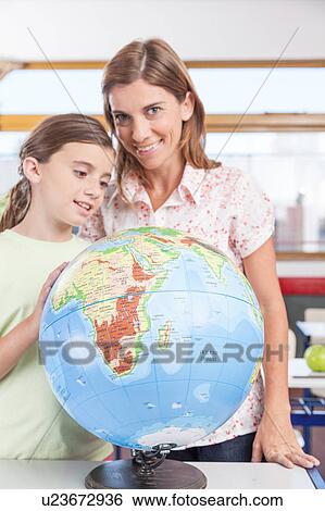 woman teaching geography. View Large Photo Image Stock Photograph - woman teaching geography.. Fotosearch