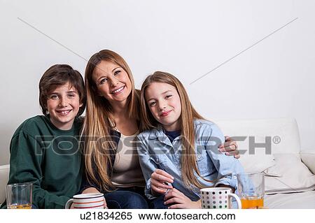 Woman with your two childrens View Large Photo Image Stock Photography - Woman with your two childrens. Fotosearch