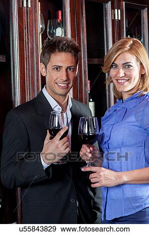 Young couple in love making a toast View Large Photo Image Stock Photo - Young couple in love making a toast. Fotosearch