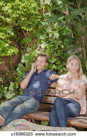 Stock Photography - Young couple upset. Fotosearch