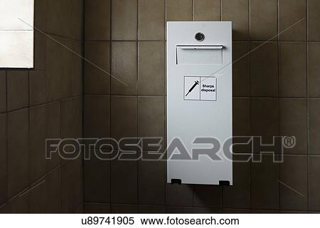 "Needle disposal bin for drug users, in public toilet" View Large Illustration Stock Illustration - "Needle disposal bin for drug users, in public toilet". Fotosearch