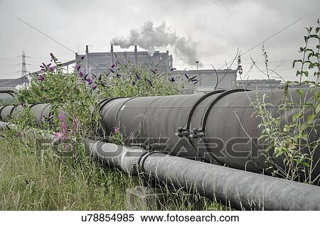 Stock Illustration - "Pipeline and steelworks. Photographed in Teesside, UK". Fotosearch