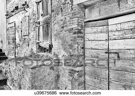 Stock Photograph - Medieval street of tiny Umbrian borgo Italy. Fotosearch