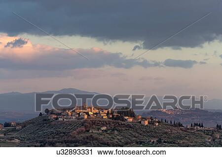 Stock Image - MonteCastello and Todi Hilltop Towns, Umbrian Landscape at sunset. Fotosearch