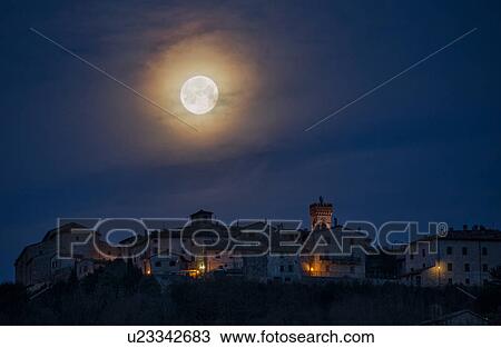 Moon setting over MonteCastello di Vibio View Large Photo Image Stock Image - Moon setting over MonteCastello di Vibio. Fotosearch