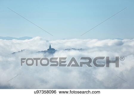 Morning Umbrian fog over hlll top Umbrian town, Italy View Large Photo Image Stock Photograph - Morning Umbrian fog over hlll top Umbrian town, Italy. Fotosearch
