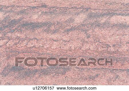 Stock Photo - Patterns in red sand. Fotosearch