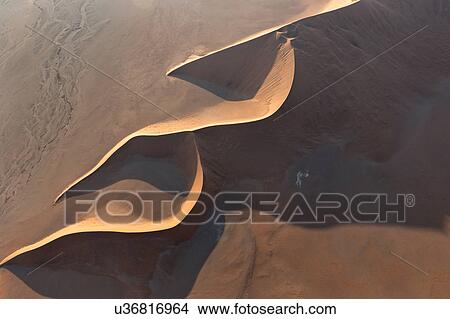 Red dunes calligraphy View Large Photo Image Picture - Red dunes calligraphy. Fotosearch