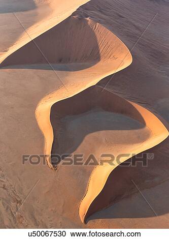 Stock Image - Red dunes calligraphy. Fotosearch