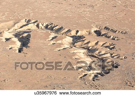 River carvings in the sand View Large Photo Image Stock Photograph - River carvings in the sand. Fotosearch