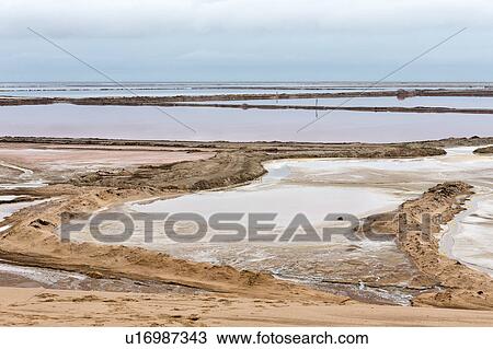 Stock Image - Salt pans in the Namib desert. Fotosearch