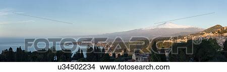 Picture - Sicily in springtime: Easter Culture, beaches, snow covered mountains, central landscapes, architecture shaped by the centuries, Italy. Fotosearch