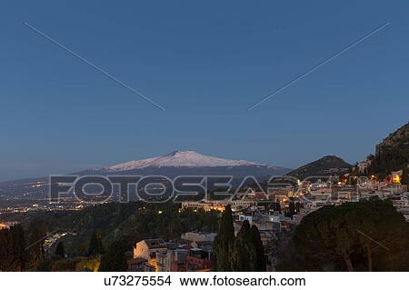 Picture - Sicily in springtime: Easter Culture, beaches, snow covered mountains, central landscapes, architecture shaped by the centuries, Italy. Fotosearch