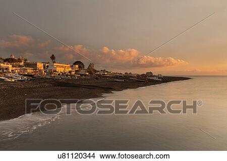 Picture - Sicily in springtime: Easter Culture, beaches, snow covered mountains, central landscapes, architecture shaped by the centuries, Italy. Fotosearch