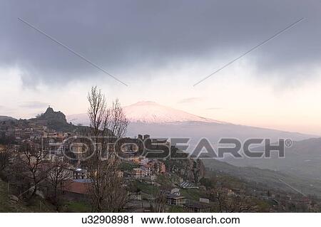 Stock Image - Sicily in springtime: Easter Culture, beaches, snow covered mountains, central landscapes, architecture shaped by the centuries, Italy. Fotosearch