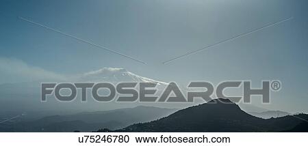 Stock Image - Sicily in springtime: Easter Culture, beaches, snow covered mountains, central landscapes, architecture shaped by the centuries, Italy. Fotosearch
