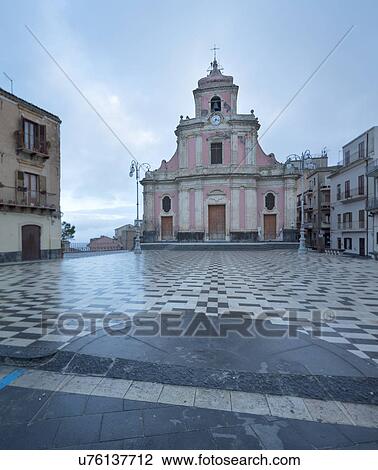 Stock Image - Sicily in springtime: Easter Culture, beaches, snow covered mountains, central landscapes, architecture shaped by the centuries, Italy. Fotosearch