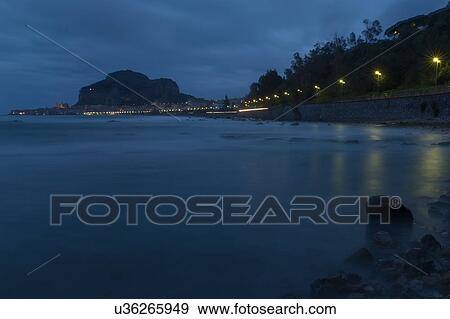 Stock Photo - Sicily in springtime: Easter Culture, beaches, snow covered mountains, central landscapes, architecture shaped by the centuries, Italy. Fotosearch