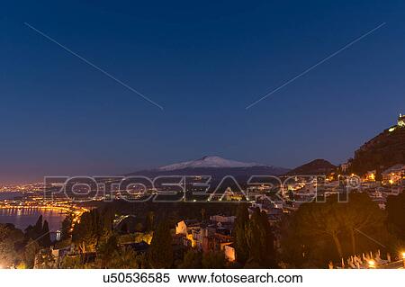 Stock Photography - Sicily in springtime: Easter Culture, beaches, snow covered mountains, central landscapes, architecture shaped by the centuries, Italy. Fotosearch
