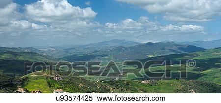 Stock Photography - Sicily in springtime: Easter Culture, beaches, snow covered mountains, central landscapes, architecture shaped by the centuries, Italy. Fotosearch