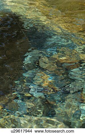 Slate, stream, and sunlight View Large Photo Image Picture - Slate, stream, and sunlight. Fotosearch