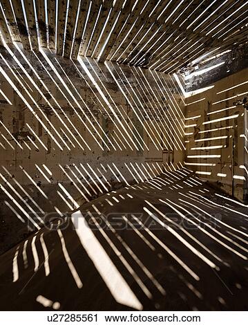 Stock Image - Slats and shadows. Fotosearch